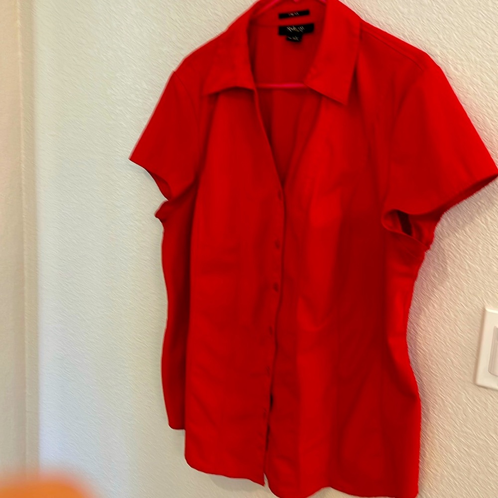 This women’s top is gently worn and machine washable